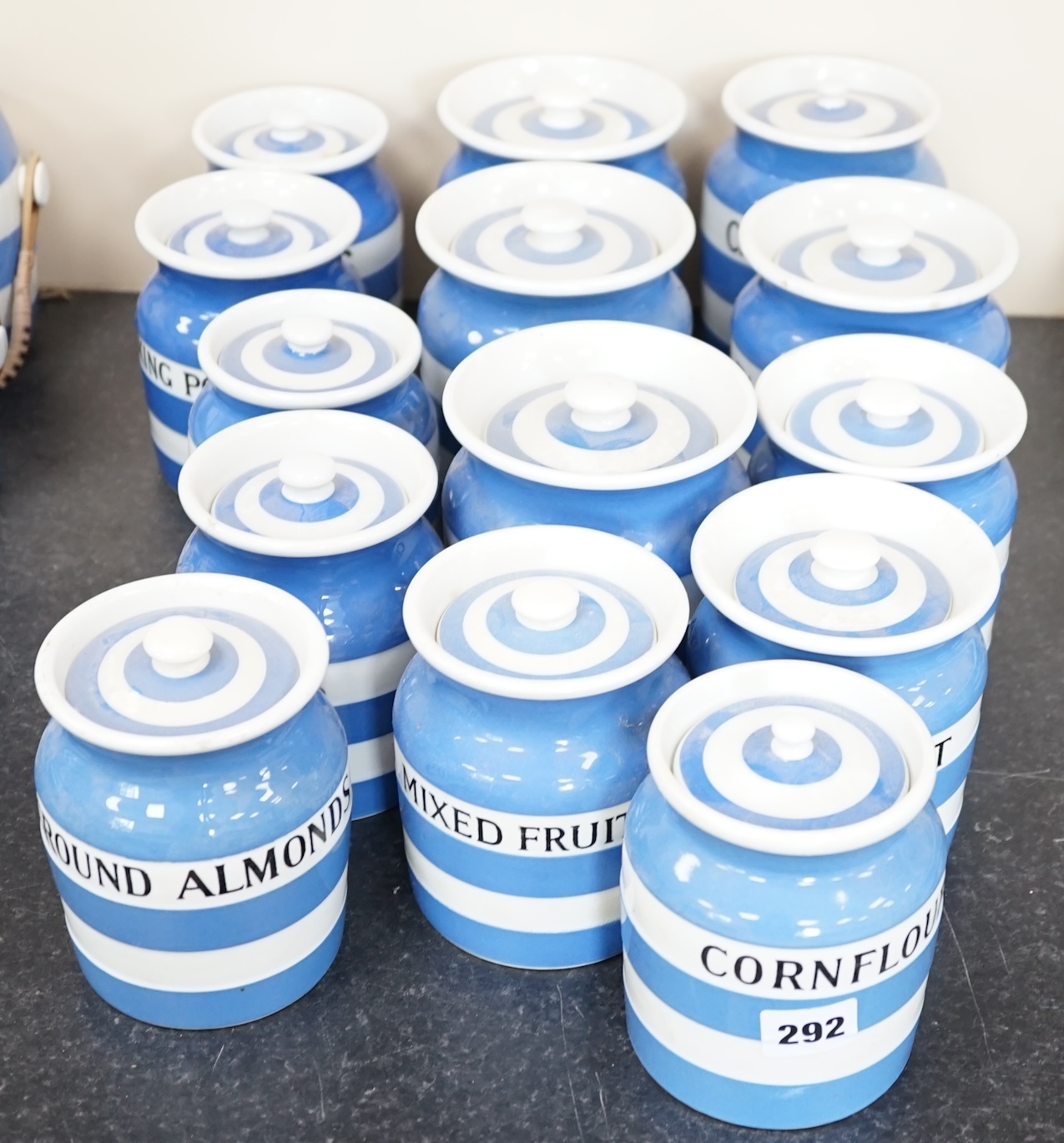T.G.Green Cornish Kitchenware, fourteen lidded storage jars to include China Tea, Salt, Table Salt, Peel, Currants, Baking Powder and Ground Almonds, largest 14cm high, mixed marks. Condition - fair to good